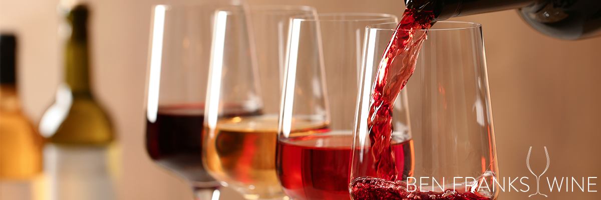 Read about the latest events in the wine trade that you can't miss. Here's a photo of some glasses of wine being poured.